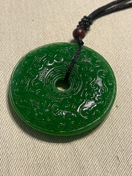 Jade Donut Intricately Carved Pendant Necklace
