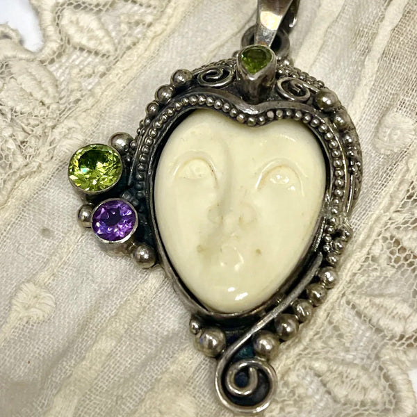 Carved Bone Goddess Face with Peridot and Amethyst Vintage Sterling Silver Pendant by Sajen