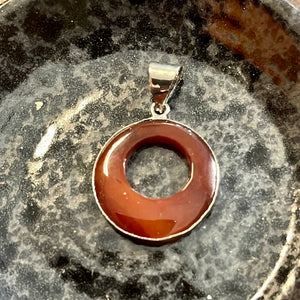 Carnelian Round Cutout Silver Finish Pendant