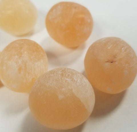 Peach Selenite Round Pocket Stone