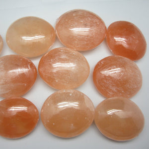 Peach Selenite Palm Stone