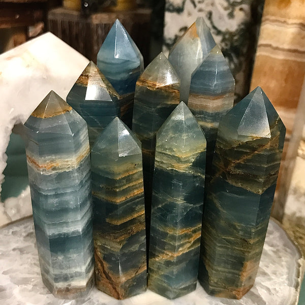 Blue Onyx (Lemurian Aquatine Calcite) Tower measuring between 2.75” and 4”