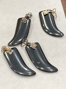 Hematite Italian horn pendants