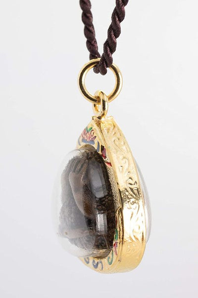 The Weeping Buddha Golden Amulet